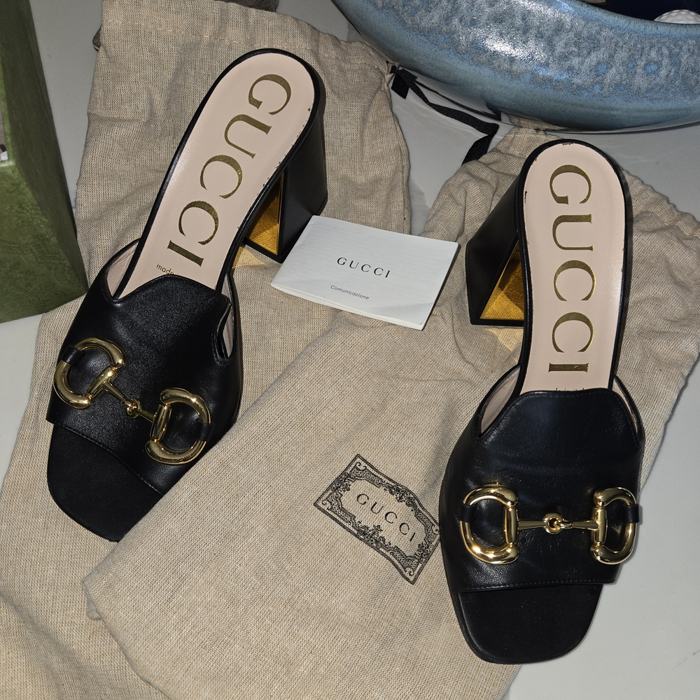 Gucci Black Leather Mules with Gold Accents